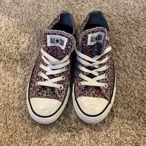 Gray, pink, black cheetah Converse.